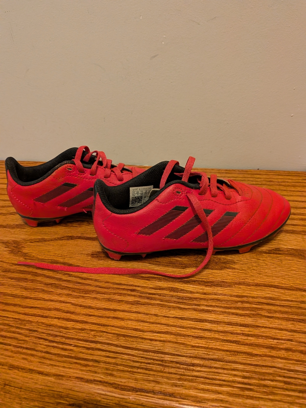 adidas Kids Red Soccer Cleats with Black Stripes